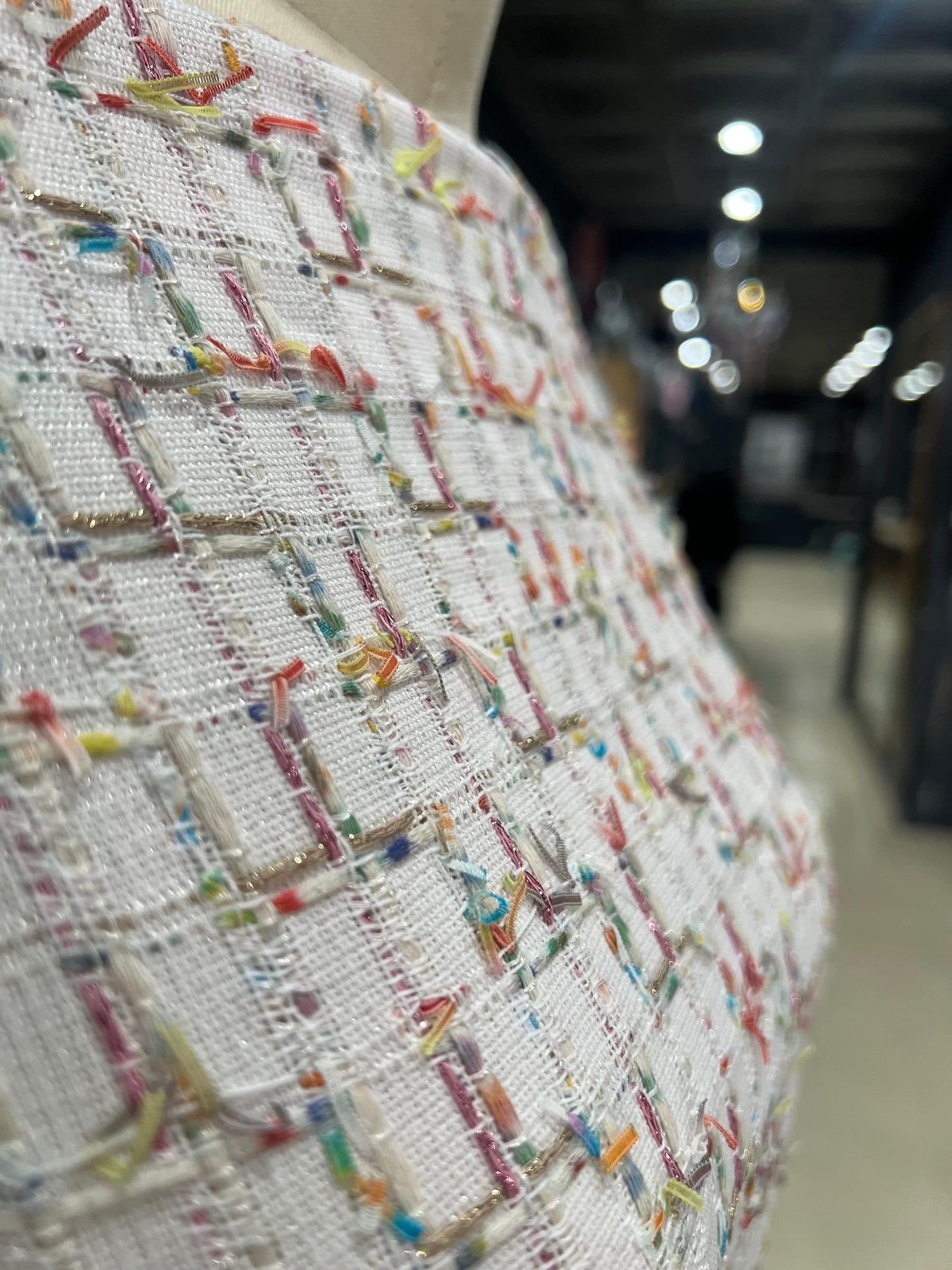Linton Tweeds fabric in white cream with metallic pink, gold, and multicolored couture boucle, designed by Papermaple Studio.